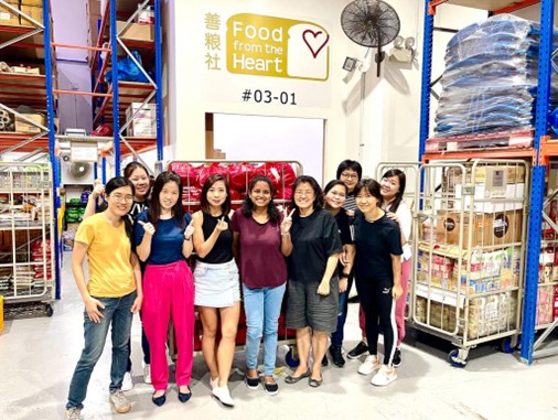 Picture of our staff volunteering at Food from the Heart.